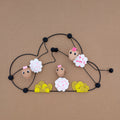 La partie de saute-mouton – Trio de moutons décoratifs